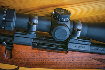 Here the magazine spacer can be seen. It can make the rifle a little challenging to load quickly. Also, note the Leupold CDS ZL2 locking turret, this ensures the rifle stays zeroed no matter how long the bumpy  road may be.